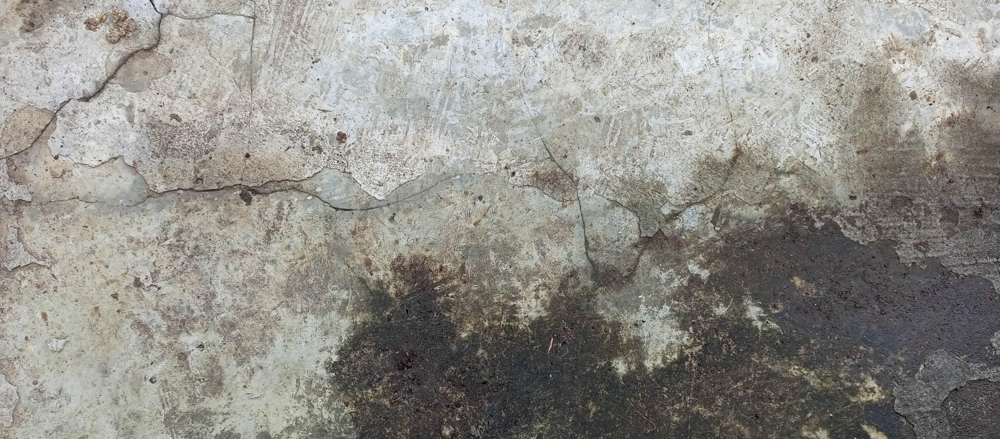 Cracked concrete viewed from overhead, structural cracking reference